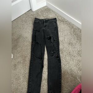 TopShop Black ripped skinny jeans- medium waist 26